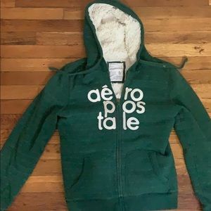 I’m selling a green sweatshirt that is very fluffy